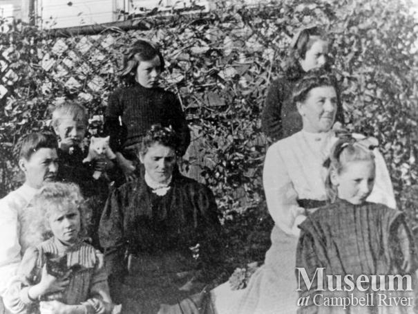 Group in front of Mr. Charlie Allen's home at Gorge Harbour, Cortes Island