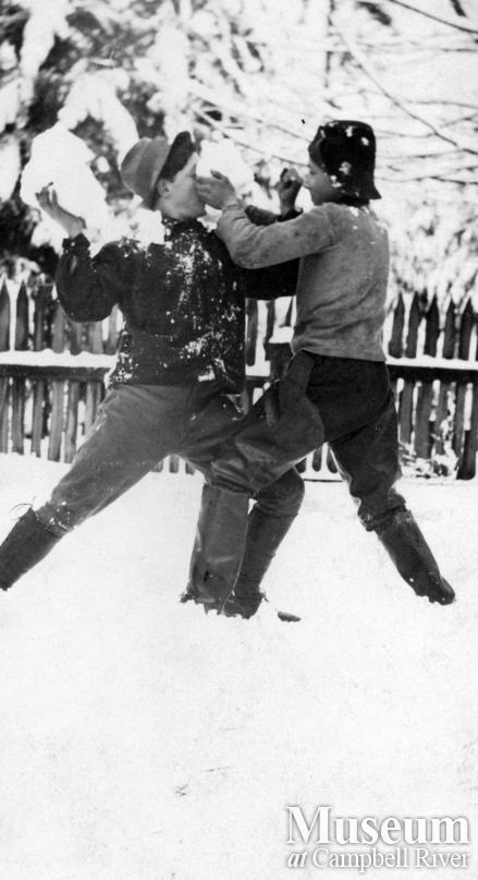 Rob and Frank Yeatman having a snow ball fight, Quadra Island	