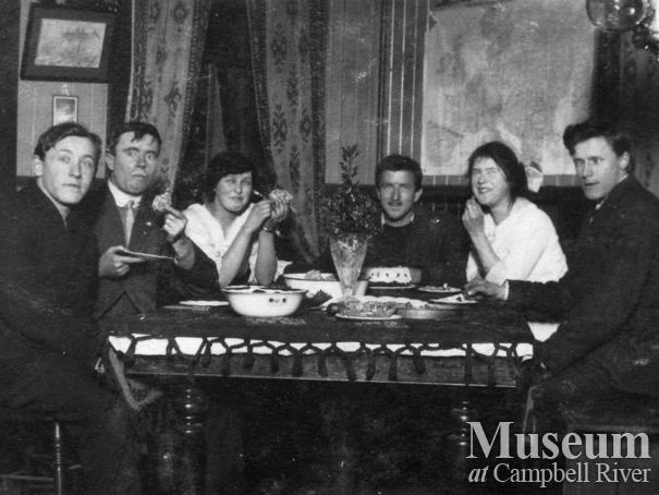 Yeatman family having dinner on Christmas Day at their home