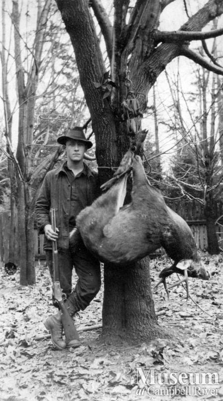Rob Yeatman with buck, Quadra Island