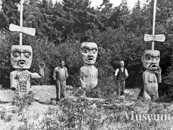 Three carved welcome figures at Cape Mudge, Quadra Island