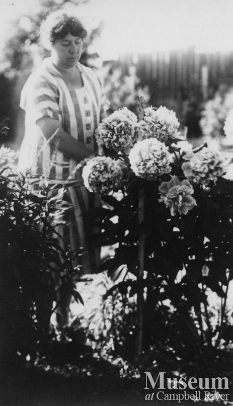 Agnes Twidle in her garden, Granite Bay, Quadra Island