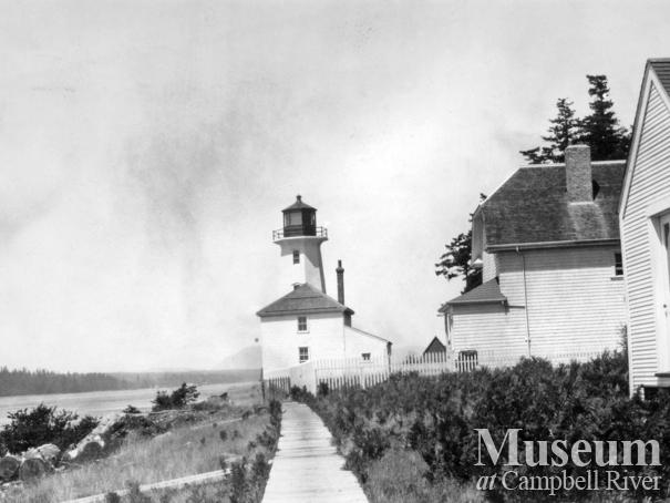 View of the buildings and lighthouse at Cape Mudge, Quadra Island