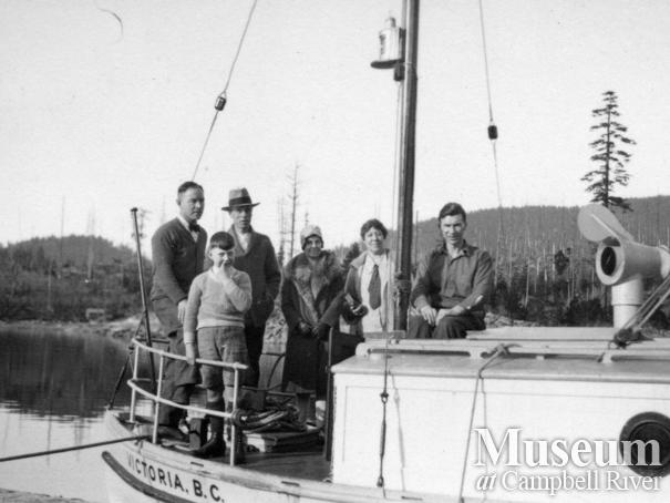 Agnes Twidle on deck of a boat with friends