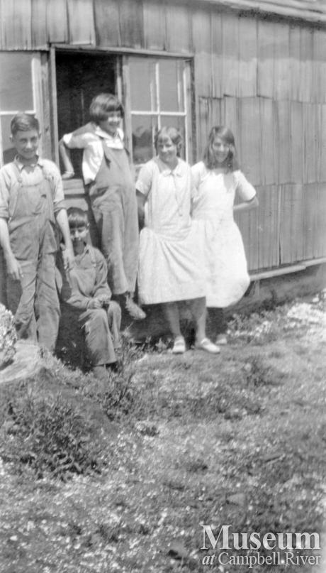 Teacher Doris Nye with pupils at the schoolhouse on Read Island