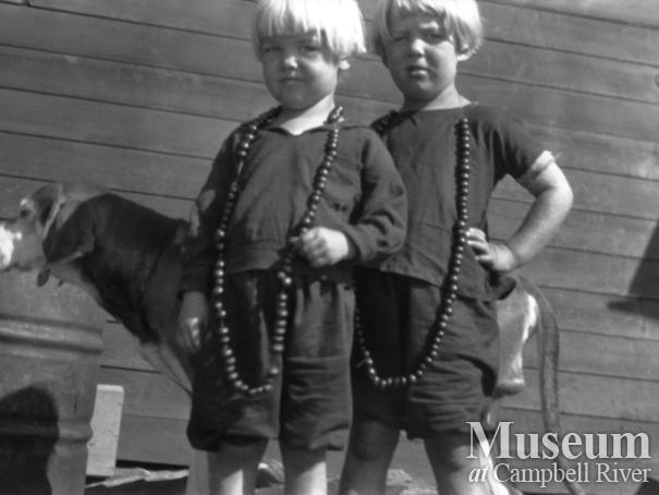 August and Zaida Schnarr's daughters wearing rose hip necklaces