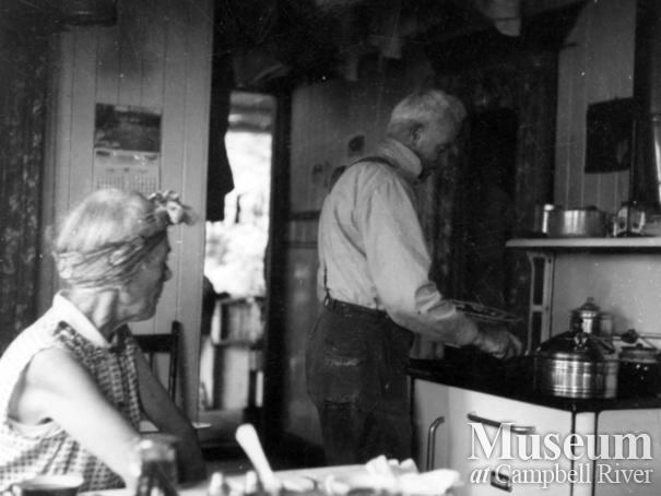 Jim Staton cooking pancakes for breakfast in their kitchen