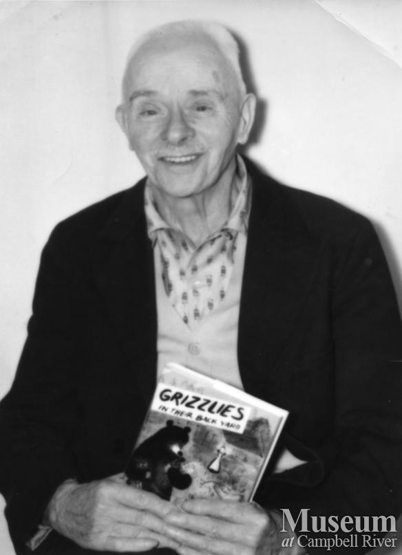 Jim Stanton with book Grizzlies in their back yard