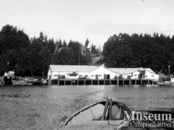View of Quathiaski Cove, Quadra Island showing several of the cannery buildings.