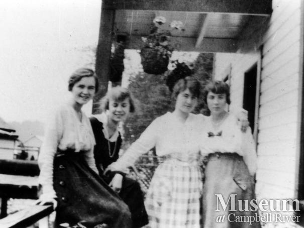 Group on the porch of the Anderson home, Quathiaski Cove, Quadra Island