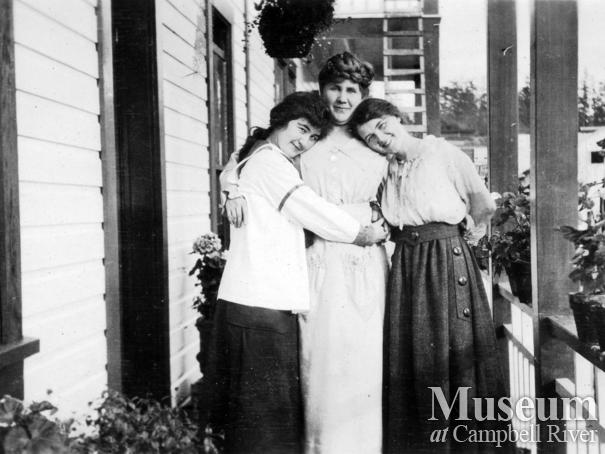 Group on the porch of the Anderson home, Quathiaski Cove, Quadra Island