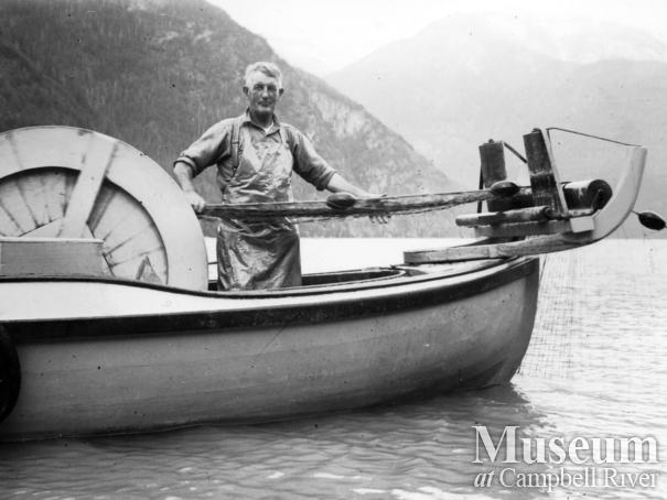 Angus Kerr hauling in his gillnet while fishing in Toba Inlet