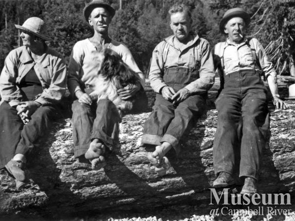 The Barrow's and friends on a log at Ramsey Arm