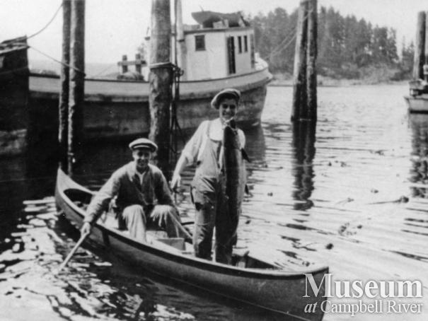 Two Quadra Island residents with catch of salmon at Quathiaski Cove