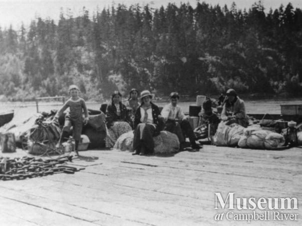 Quadra Island residents waiting for a boat at the wharf at Quathiaski Cove