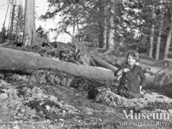 Doris Marlatt on beach at the Marlatt's homestead on Mary Island