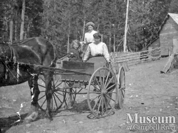 Members of the Marlatt family in a carriage