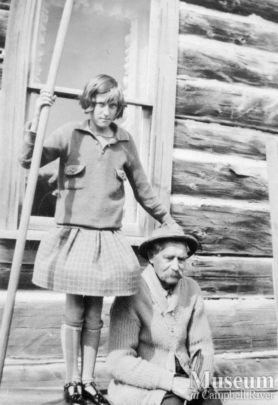 Hans Hansen with daughter, Edith  in front of their home at Port Neville, B.C.