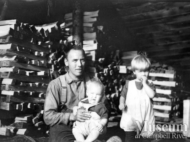 August Schnarr with two of his children