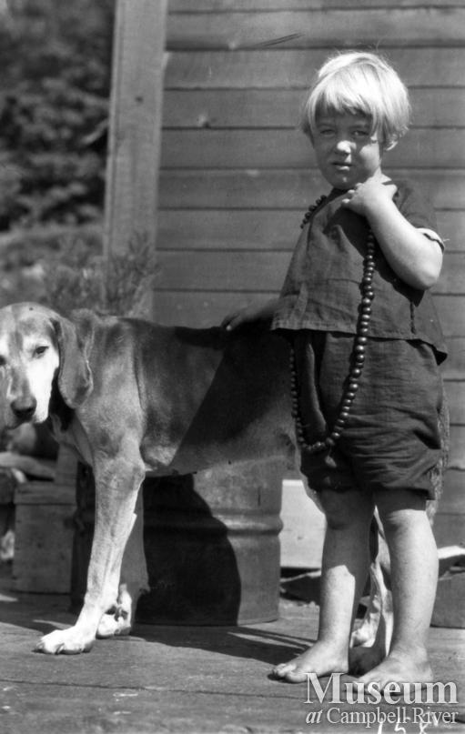 Pansy Schnarr wearing a rosehip necklace with dog